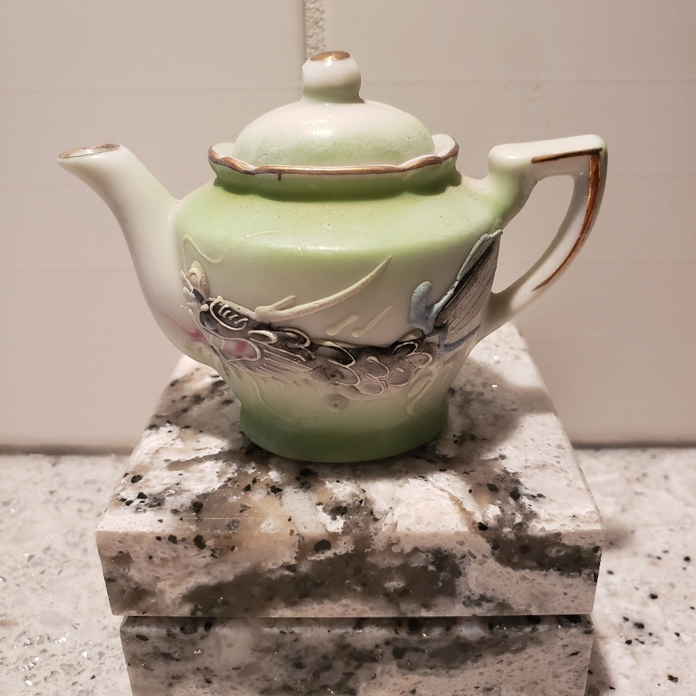 Antique Miniature Bisque Teapot.